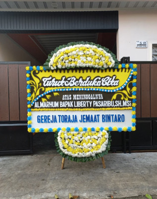 Papan Bunga Duka di Tugu Utara